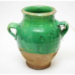 A Medieval style green glaze jar