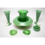 Selection of press moulded green glass