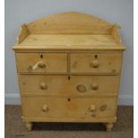 A Victorian stripped pine chest of two short and two long drawers