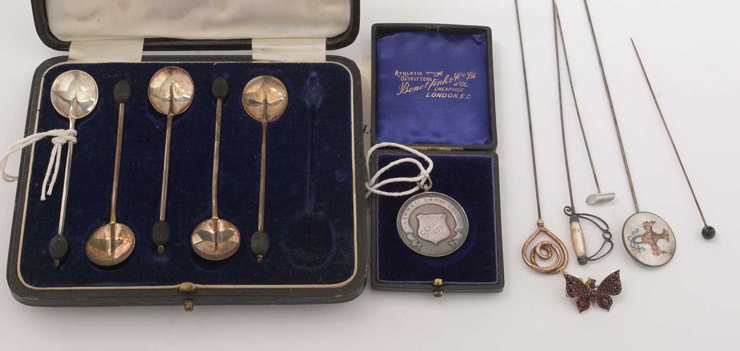 Edwardian hatpins and silver items.