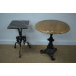 A Victorian style pub table; and a marble-topped table