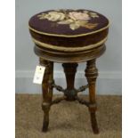 A Victorian rosewood piano stool