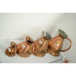 Set of four graduated copper harvest measures