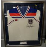 An England international football jersey signed by Sir Bobby Robson