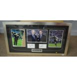 A signed and framed Newcastle United F.C. photograph display