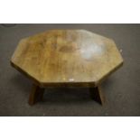 An oak octagonal coffee table