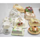 Selection of cheese dishes and covers