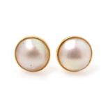 A pair of mabe pearl earrings,