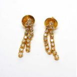 A pair of diamond tassel drop earrings