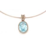 A topaz and diamond pendant by RJM,