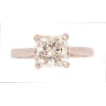A solitaire diamond ring,