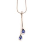 A limited edition tanzanite and diamond pendant by Catherine Best,