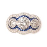 A diamond and sapphire dress ring,