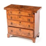 An 18th Century and later walnut chest of drawers,
