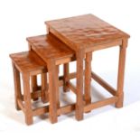 Robert 'Mouseman' Thompson of Kilburn: a nest of three oak occasional tables