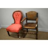 An easy chair and a studded leather armchair