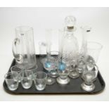 A selection of etched and cut glass ware
