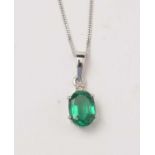 A contemporary emerald and diamond necklace.