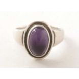 A Georg Jensen amethyst cabochon ring.