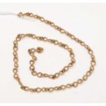 A yellow-metal fancy-link neck chain.