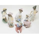 A selection of Lladro and Nao figures