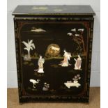 A 20th Century Chinese black lacquered side cabinet