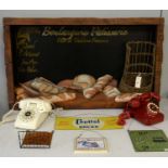 A selection of kitchen wall signs and other items