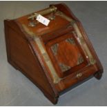A Victorian brass bound mahogany coal box