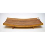 An oak curved wood platter