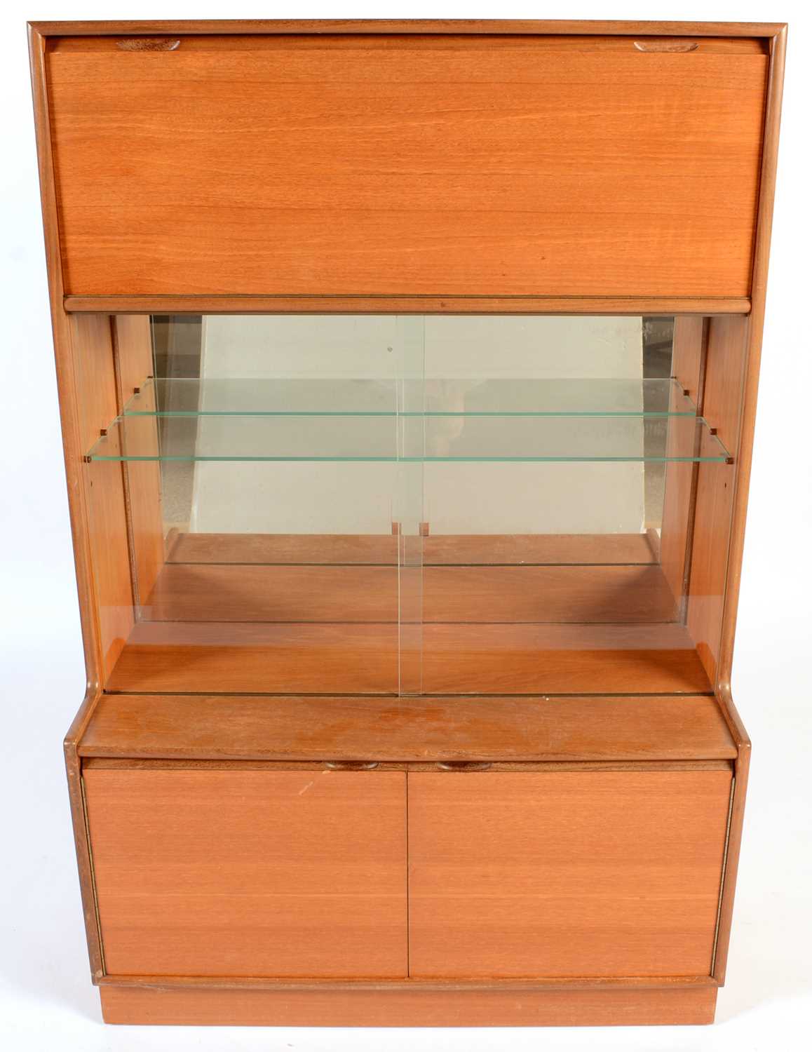 Turnidge of London Ltd: a mid Century teak mirror-backed display cabinet.