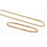 A 9ct gold rope-link necklace and bracelet.