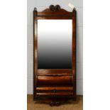A Victorian style oak wall mirror