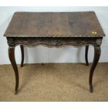 A late 19th Century oak side table