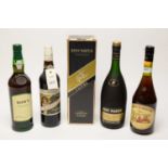 A selection of four bottles of alcohol including Remy Martin