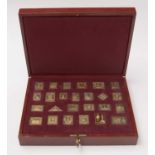"The Empire Collection" a limited-edition silver-gilt postage stamp ingot set.