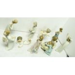 A selection of nine Lladro figures