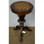 A late Victorian walnut games table