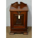 An Edwardian mahogany coal purdonium