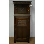 A 20th Century oak court cupboard