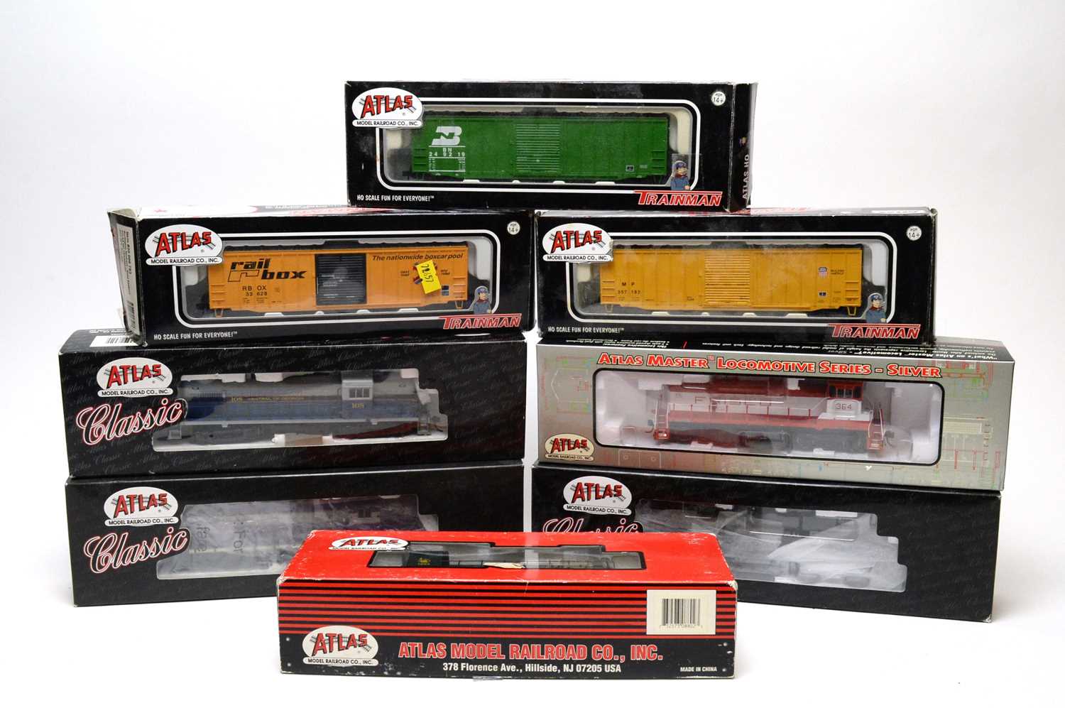 Eight Atlas H0-gauge trains.