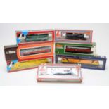 Eight boxed LIMA HO-gauge model trains.