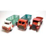 Three Tri-ang and other tinplate vehicles.