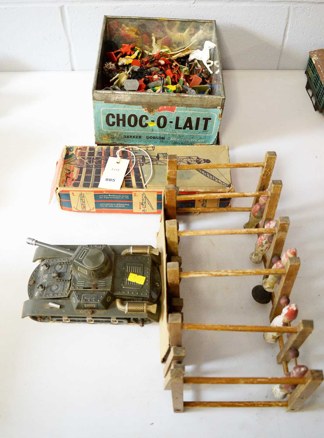 Gescha Manovrier tank, a baby's wooden toy, Lone Star and other figures.