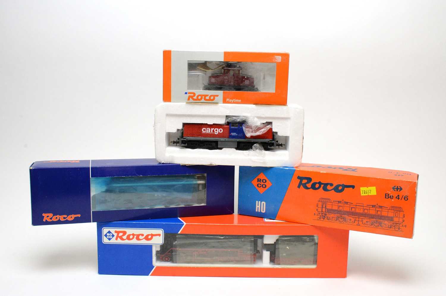 Five Roco HO-gauge trains.