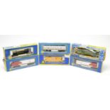Six boxed AHM 00-gauge trains and rolling stock.