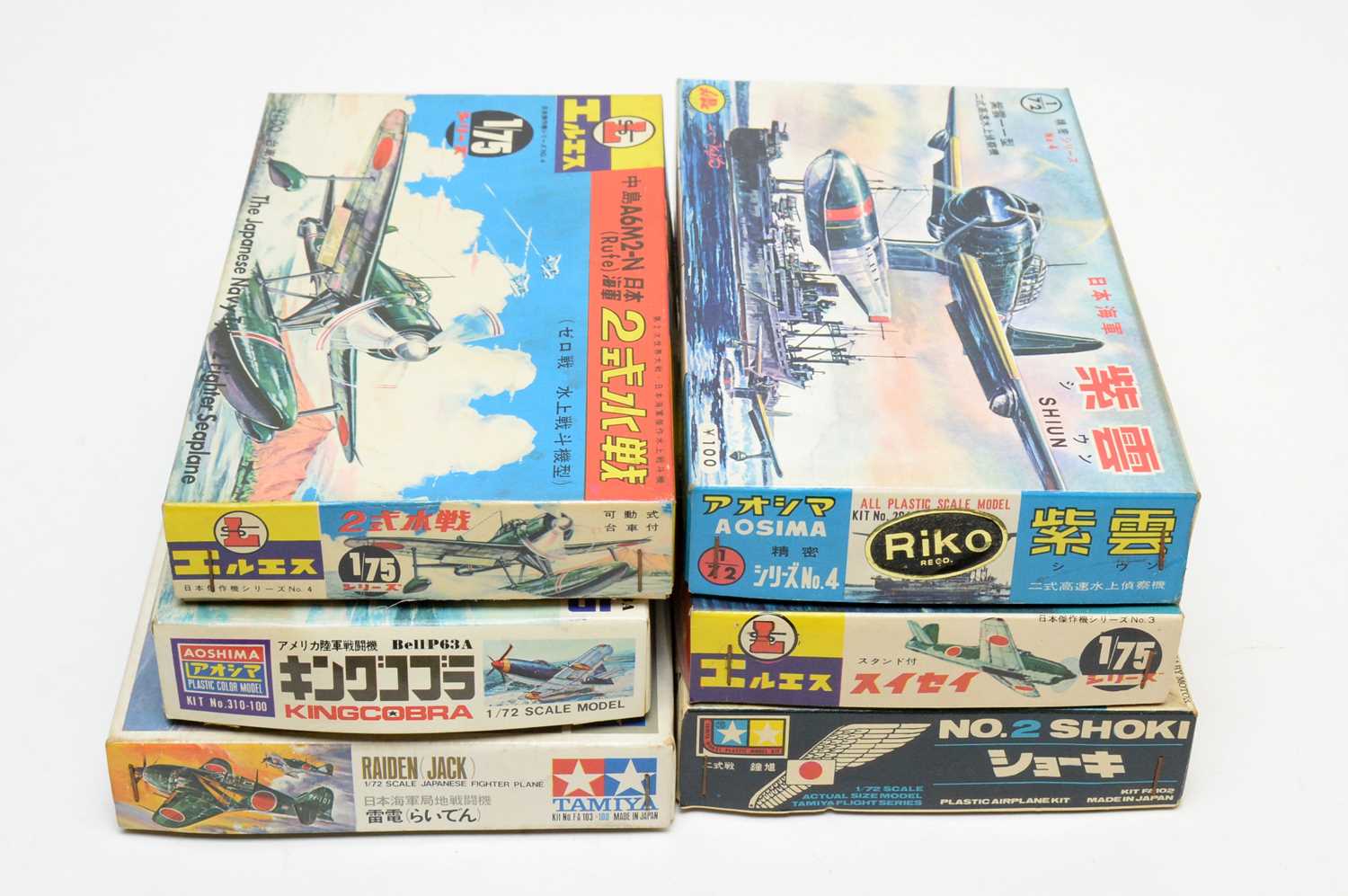 Six boxed Japanese model construction kits.