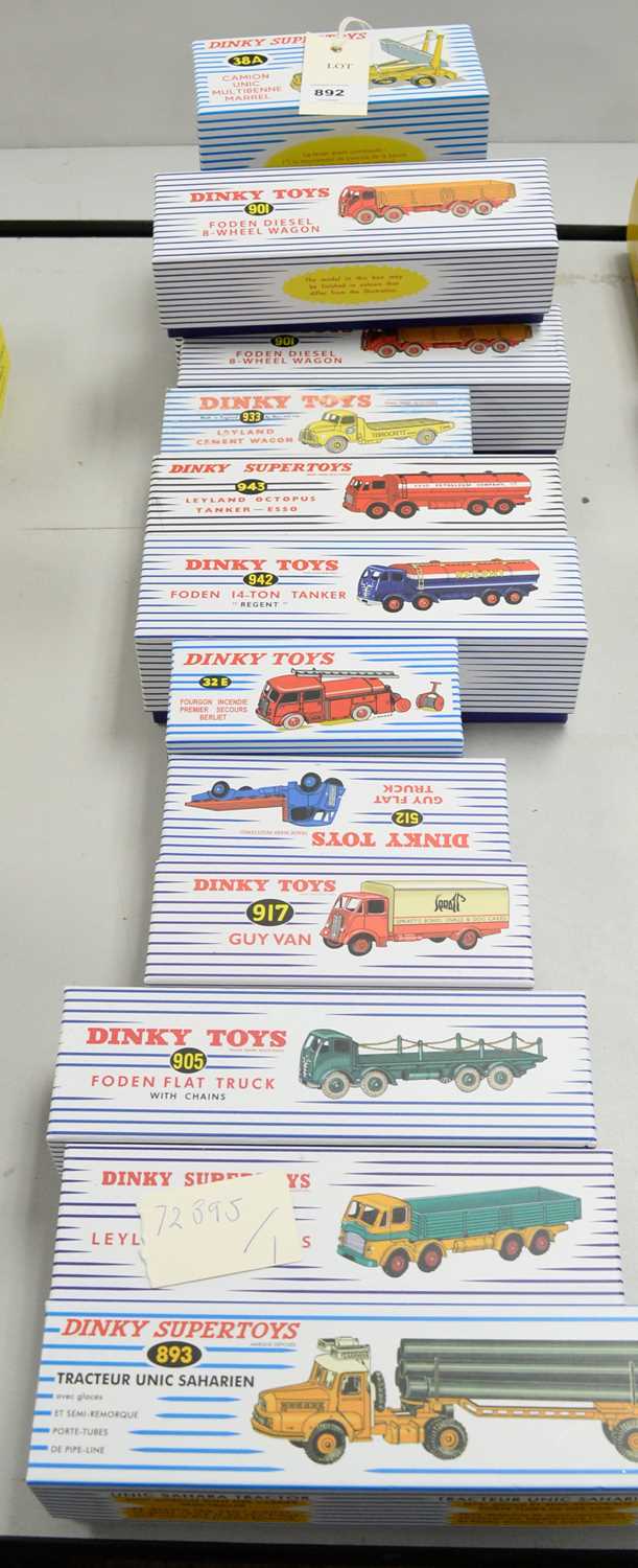 A collection of reproduction Dinky Toys diecast commercial vehicles.