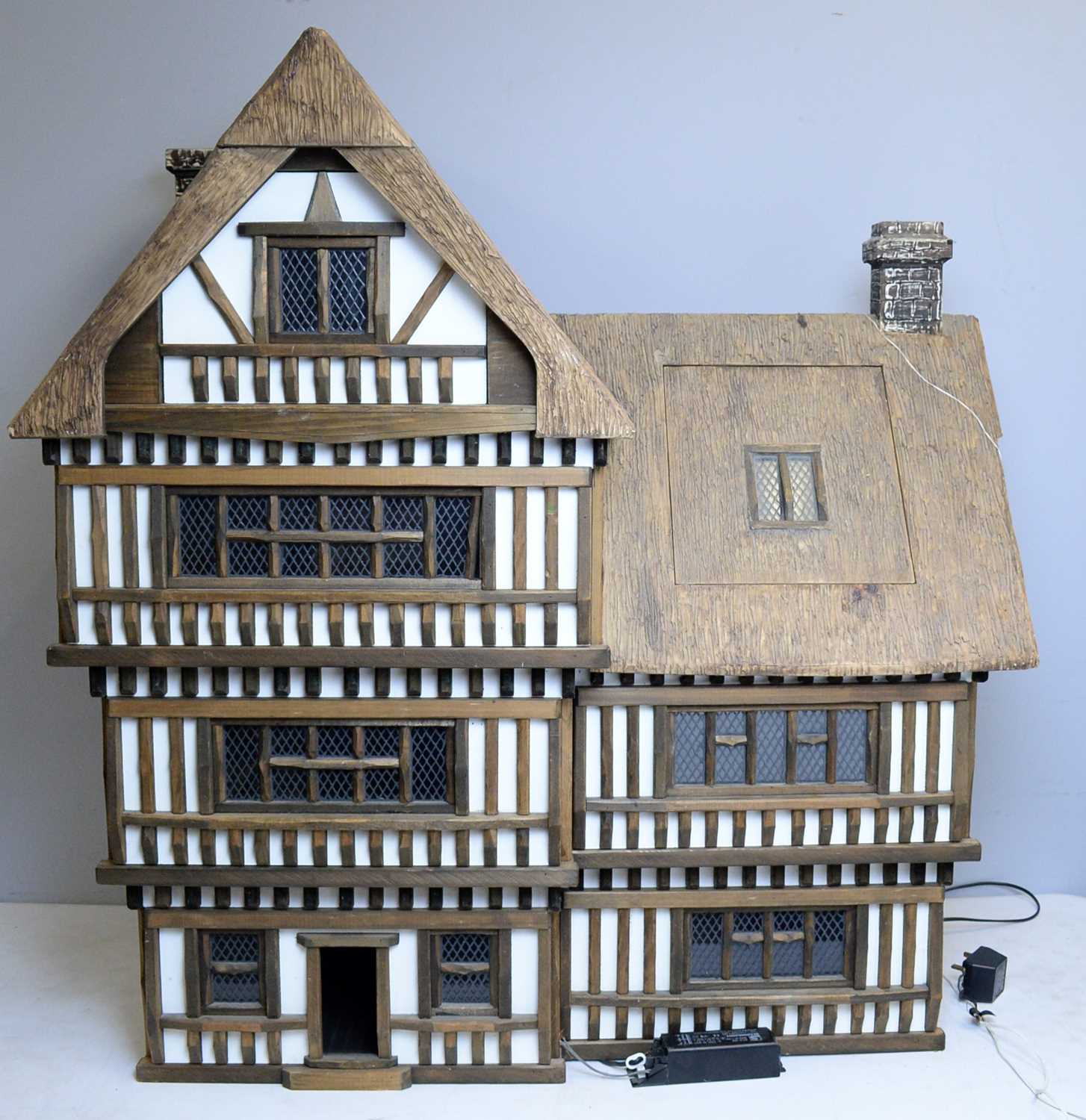 A Tudor-style doll's house by Robert Stubbs