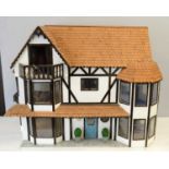 A three-storey half-timbered doll's house.