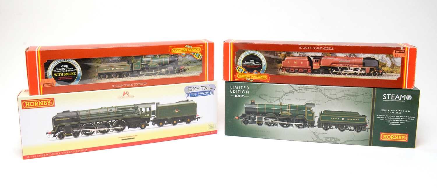 Four boxed Hornby 00-gauge locomotives.